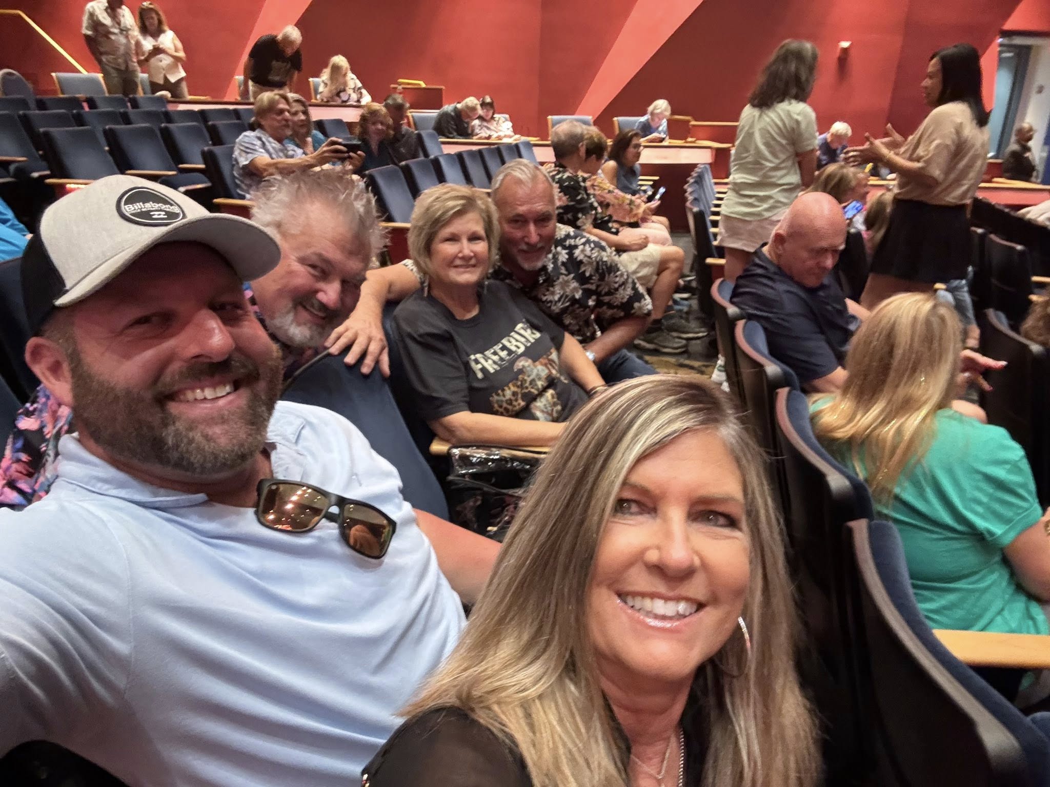 Concertgoers at Already Gone Presents The Eagles pose before the show at Stafford Centre in Stafford, TX