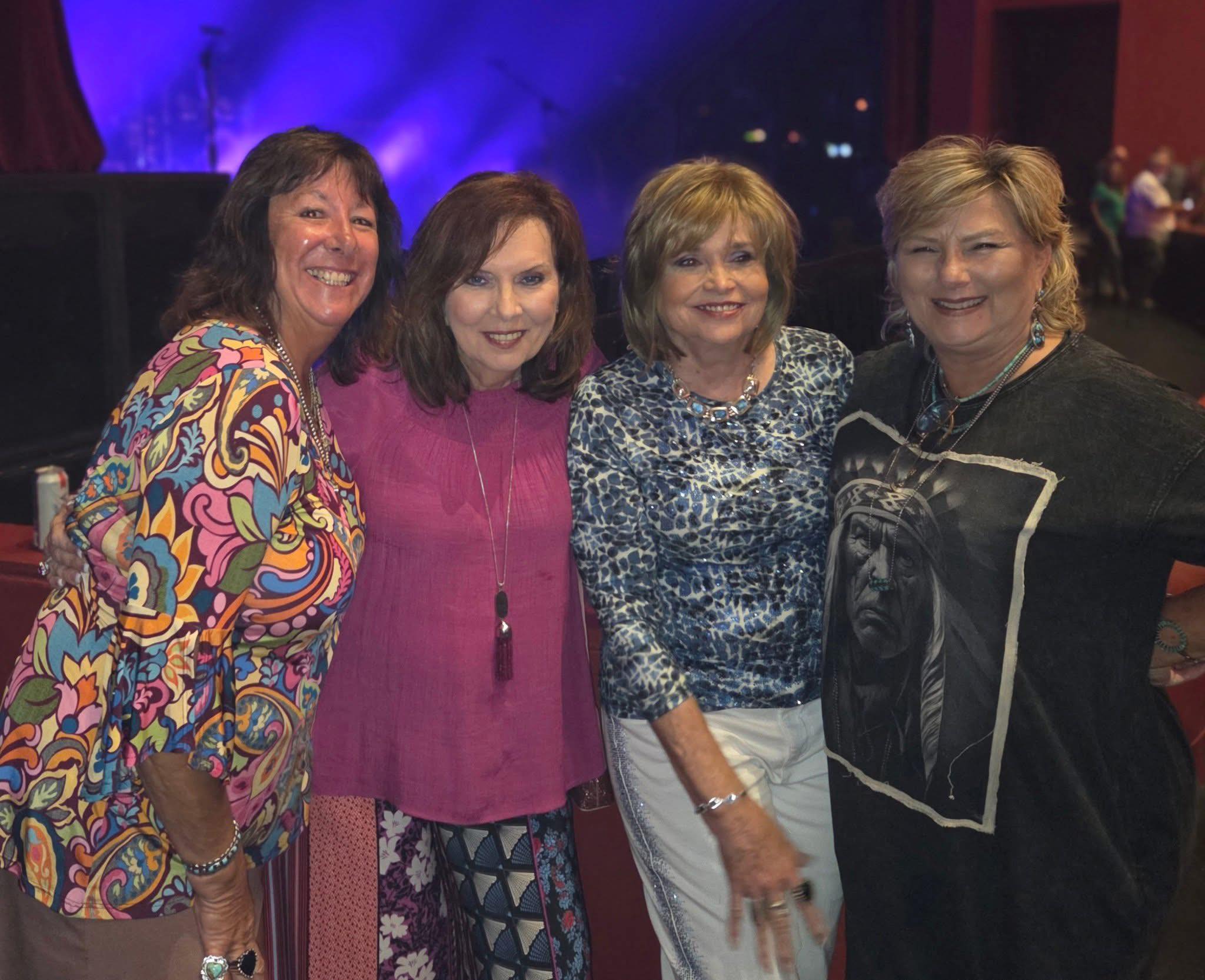 Fans from Llano, TX pose before the Already Gone show starts at Stafford Centre in Stafford, TX