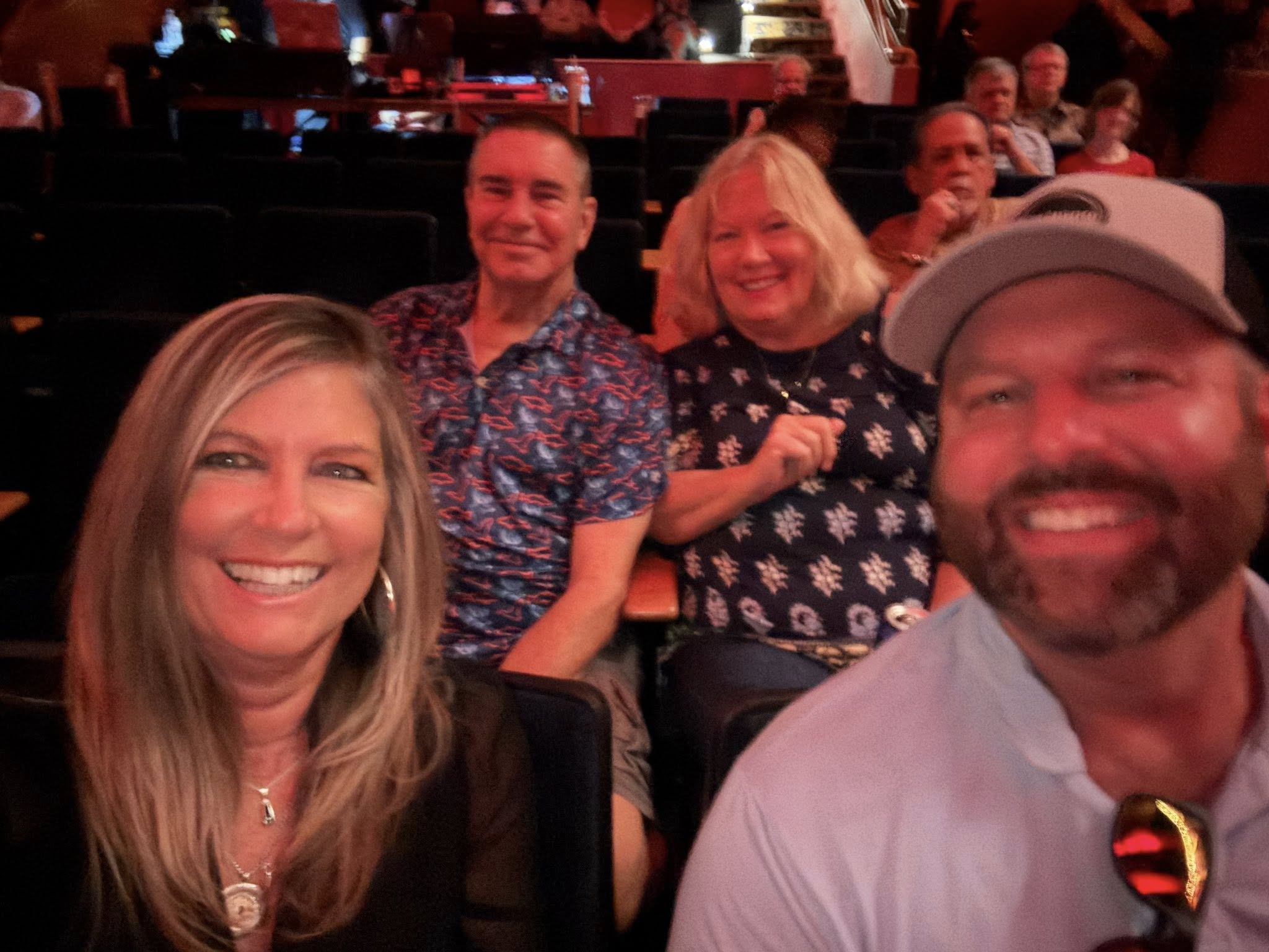 Concertgoers at Already Gone Presents The Eagles pose before the show at Stafford Centre in Stafford, TX